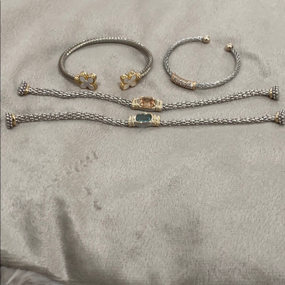 4 silver bracelets with stones